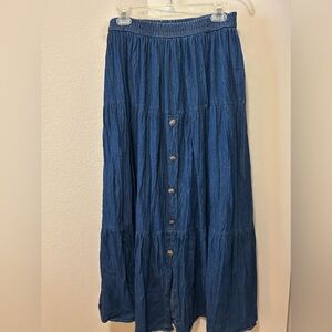 Denim Skirt with buttons in front. Size L.